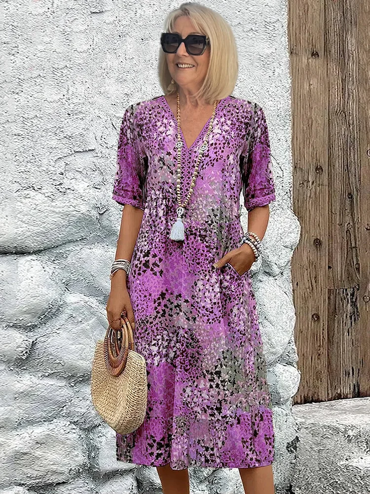 Colorful Midi Dress with Patterned Design and Functional Pockets