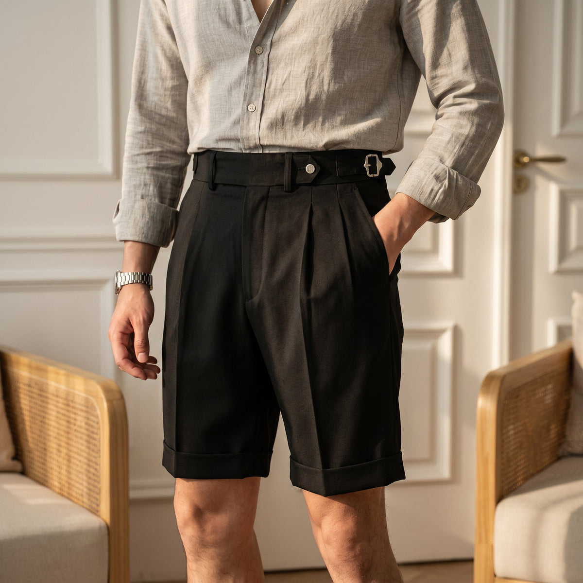 Close-up of stylish men's Gurkha shorts featuring smart pleats and a comfortable, relaxed fit for summer.
